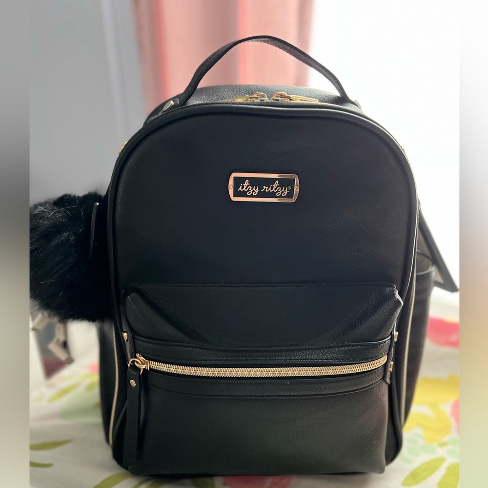 Itzy Ritzy mini boss bag